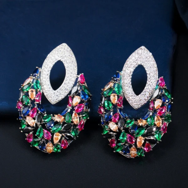 Women Chunky Black Gold Plated Colorful Cubic Zirconia Big Drop Earrings Jewelry There’s an old saying that: Jewelry is woman’s best friend. And one appropriate luxury jewelry helps to spice up your charm and beauty. And here’s the reason why you choose us: ★ We adopts high-grade Cubic Zirconia, which displays pure and fascinating color; ★ All our items are Elaborate, Gold Plated (white gold plated/yellow gold plated/black gold plated), by which the texture is smooth and with fancy look, and will be appropriate for so many occasions; ★ Our items are with Exquisite Design, which shows your excellent taste, and could catch people’s attention easily. ★ Ideal gift for mother, wife, girlfriend, daughters, brides, bridesmaids, ect. Specification Type: Dangle/Drop Earrings Stone Material: Cubic Zirconia Base Metal Material: Brass Metal Material: Black Gold Plated Shape: Geometric Color: Multicolor Suitable Occasion: Daily, Holidays, Party, Engagement, Wedding, Anniversary, Valentine’s Day, Carnival, Performance, ect. Package Includes 1 Pair of CZ Drop Earrings