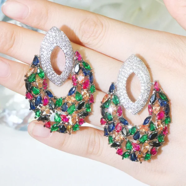 Women Chunky Black Gold Plated Colorful Cubic Zirconia Big Drop Earrings Jewelry There’s an old saying that: Jewelry is woman’s best friend. And one appropriate luxury jewelry helps to spice up your charm and beauty. And here’s the reason why you choose us: ★ We adopts high-grade Cubic Zirconia, which displays pure and fascinating color; ★ All our items are Elaborate, Gold Plated (white gold plated/yellow gold plated/black gold plated), by which the texture is smooth and with fancy look, and will be appropriate for so many occasions; ★ Our items are with Exquisite Design, which shows your excellent taste, and could catch people’s attention easily. ★ Ideal gift for mother, wife, girlfriend, daughters, brides, bridesmaids, ect. Specification Type: Dangle/Drop Earrings Stone Material: Cubic Zirconia Base Metal Material: Brass Metal Material: Black Gold Plated Shape: Geometric Color: Multicolor Suitable Occasion: Daily, Holidays, Party, Engagement, Wedding, Anniversary, Valentine’s Day, Carnival, Performance, ect. Package Includes 1 Pair of CZ Drop Earrings
